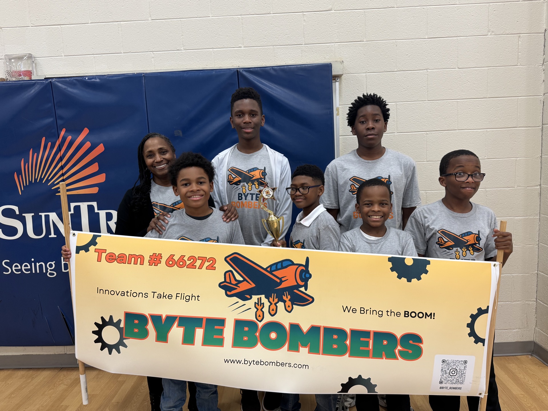 Team with coach at competition